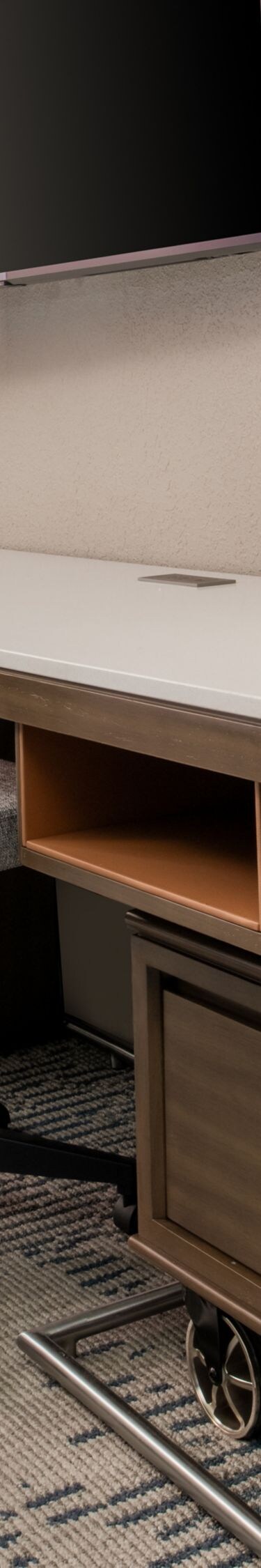 Work desk with chair and TV