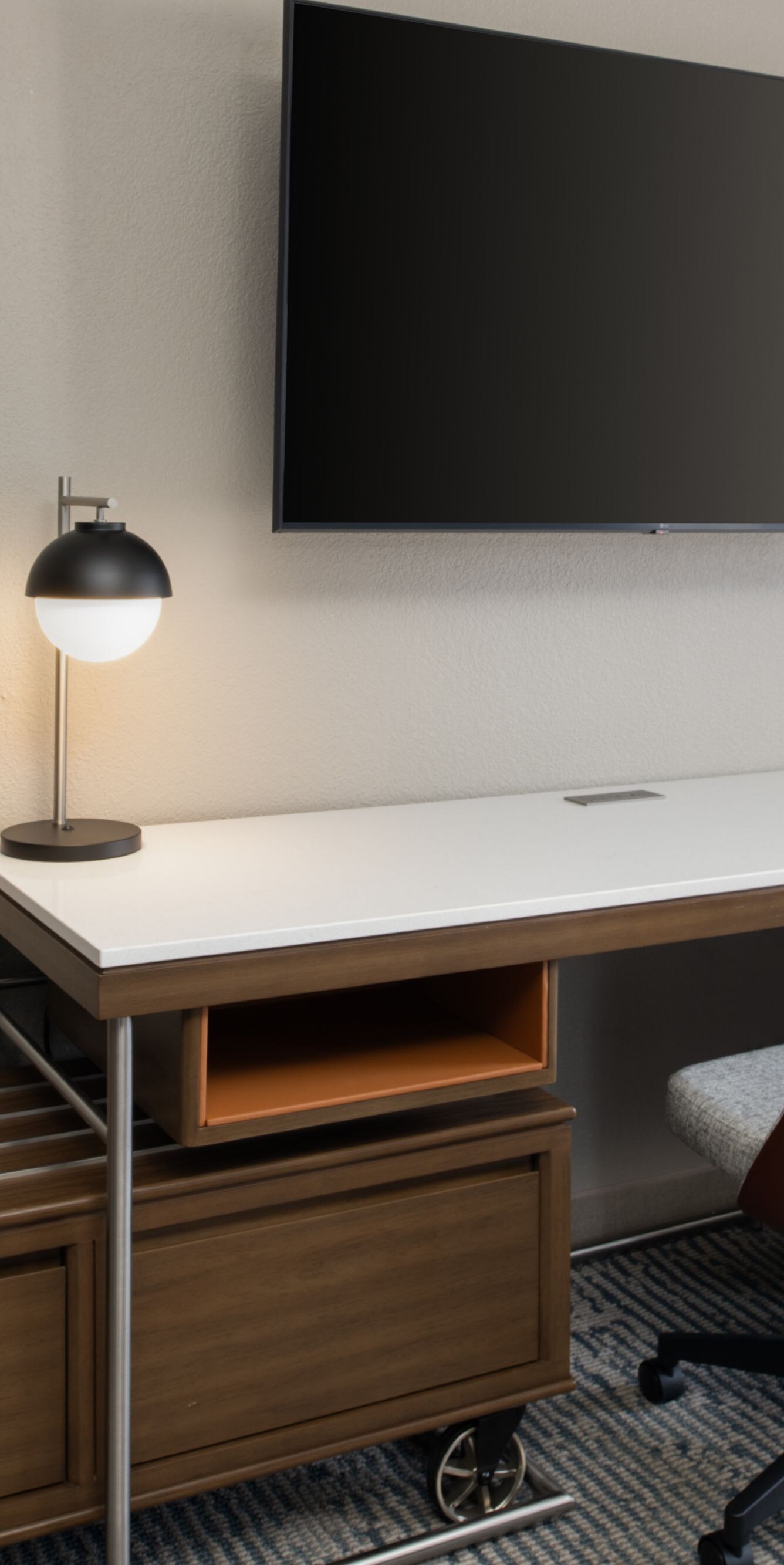 Work desk with chair and TV