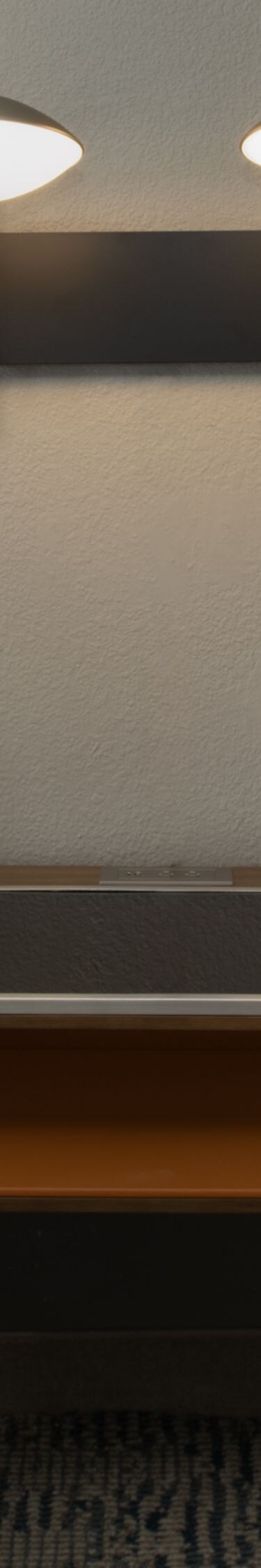 2 queen beds with nightstand between