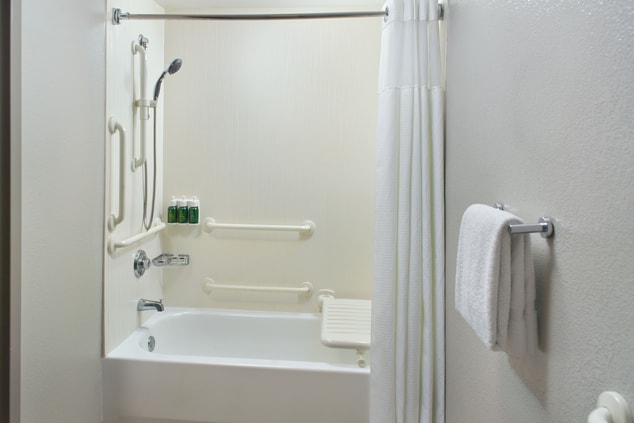 accessible tub with grab bars & towels