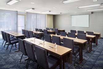 meeting room with schoolroom setup & chairs & AV