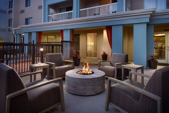firepit with chairs around it