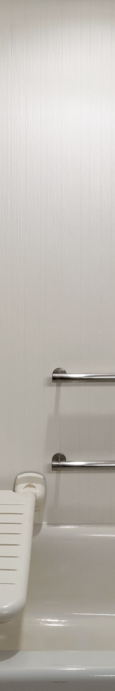 Accessible bathtub with grab bars and seat