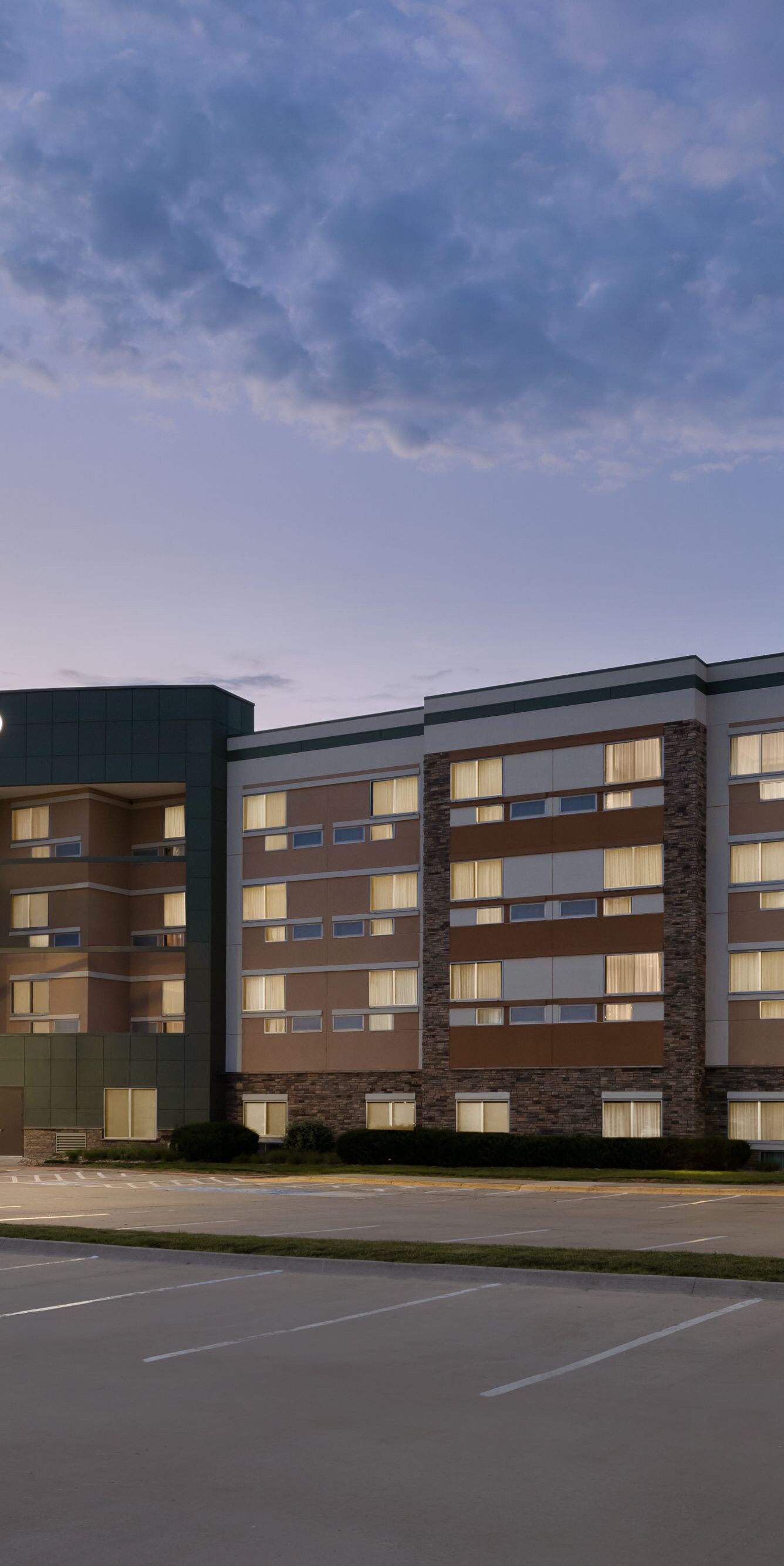 Exterior and parking lot at dusk
