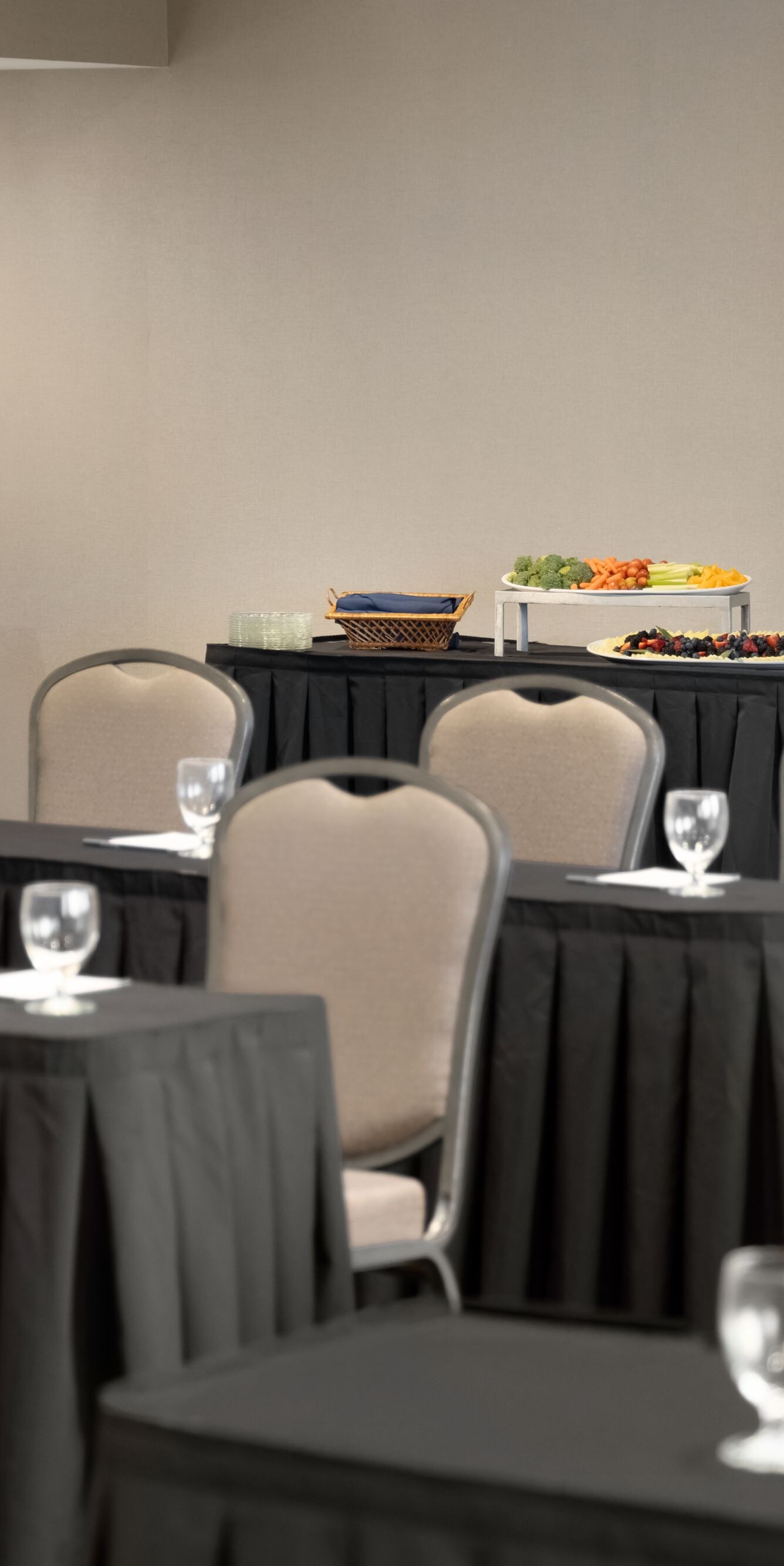 Meeting room with classroom seating and buffet