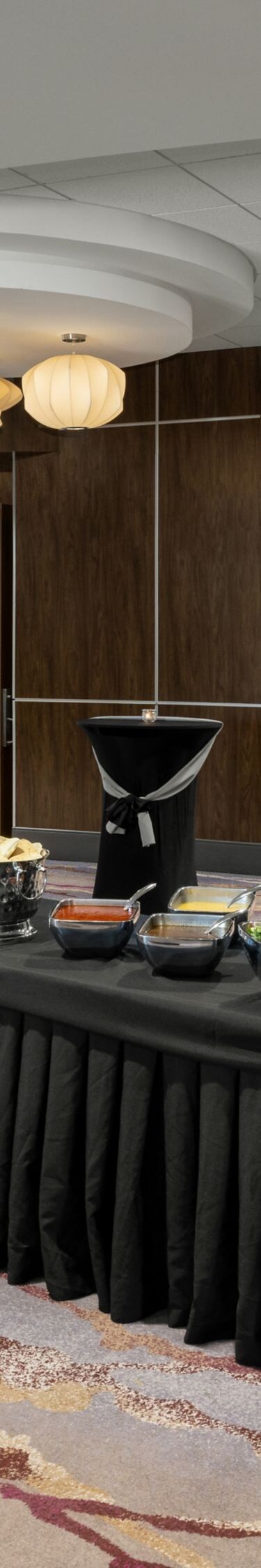 setup of buffet table and cocktail tables