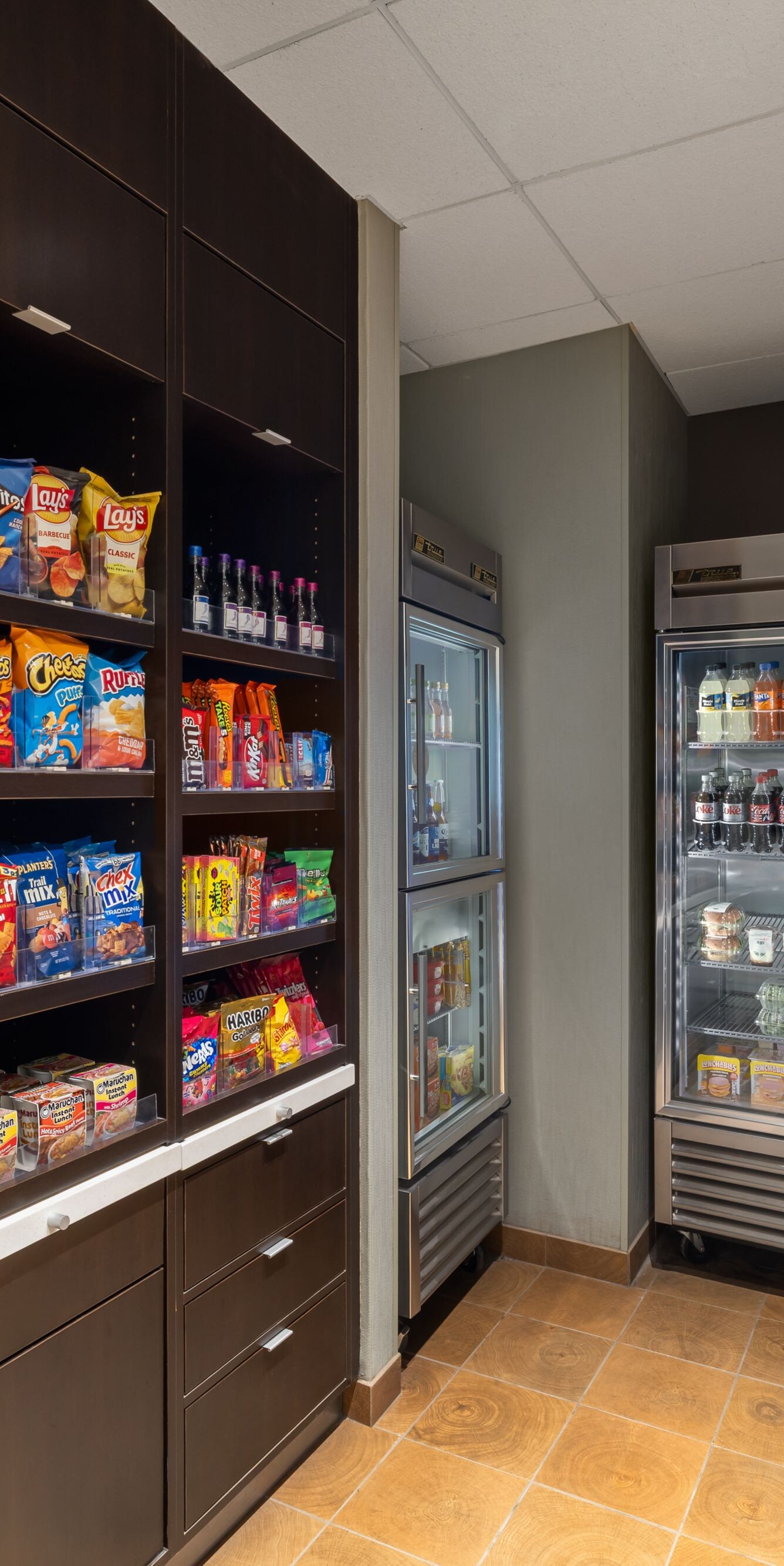 Market area with snacks and refrigerators