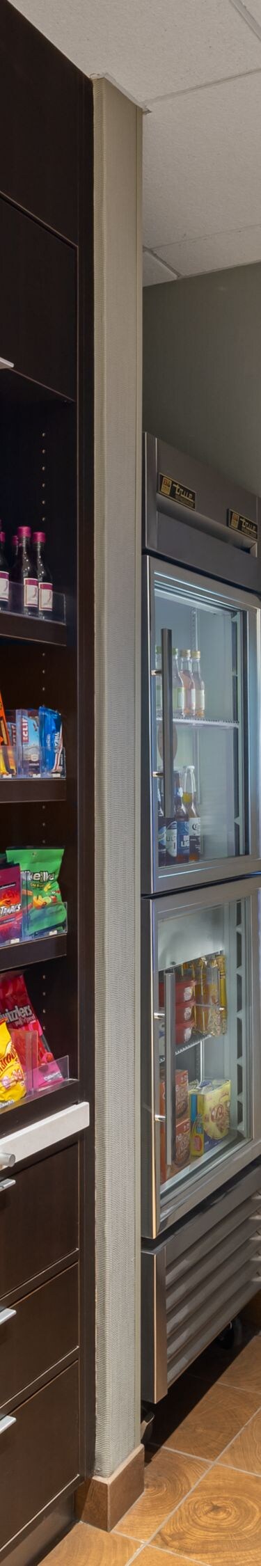 Market area with snacks and refrigerators