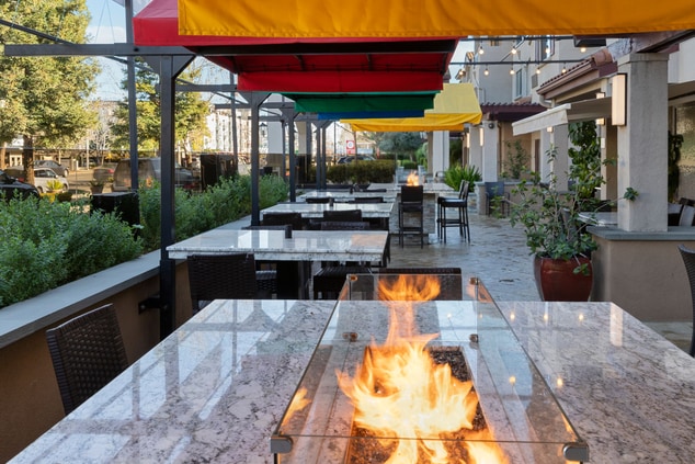 Outdoor patio, fire pit, tables and chairs