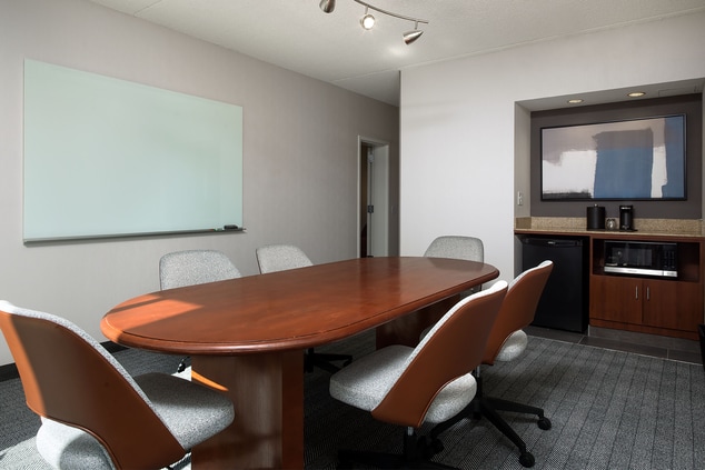 conference table, suite, whiteboard