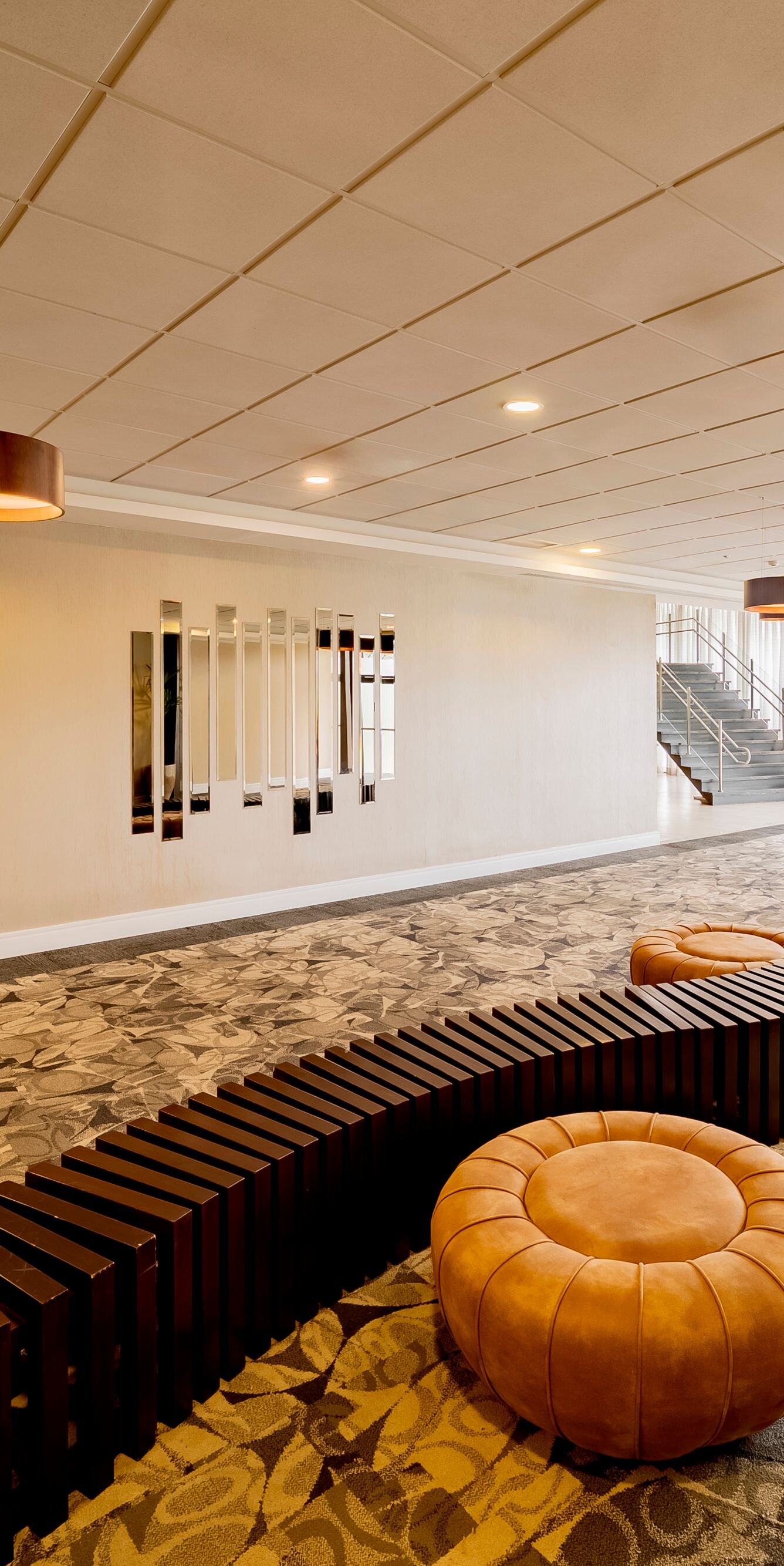 Foyer with seating and natural light