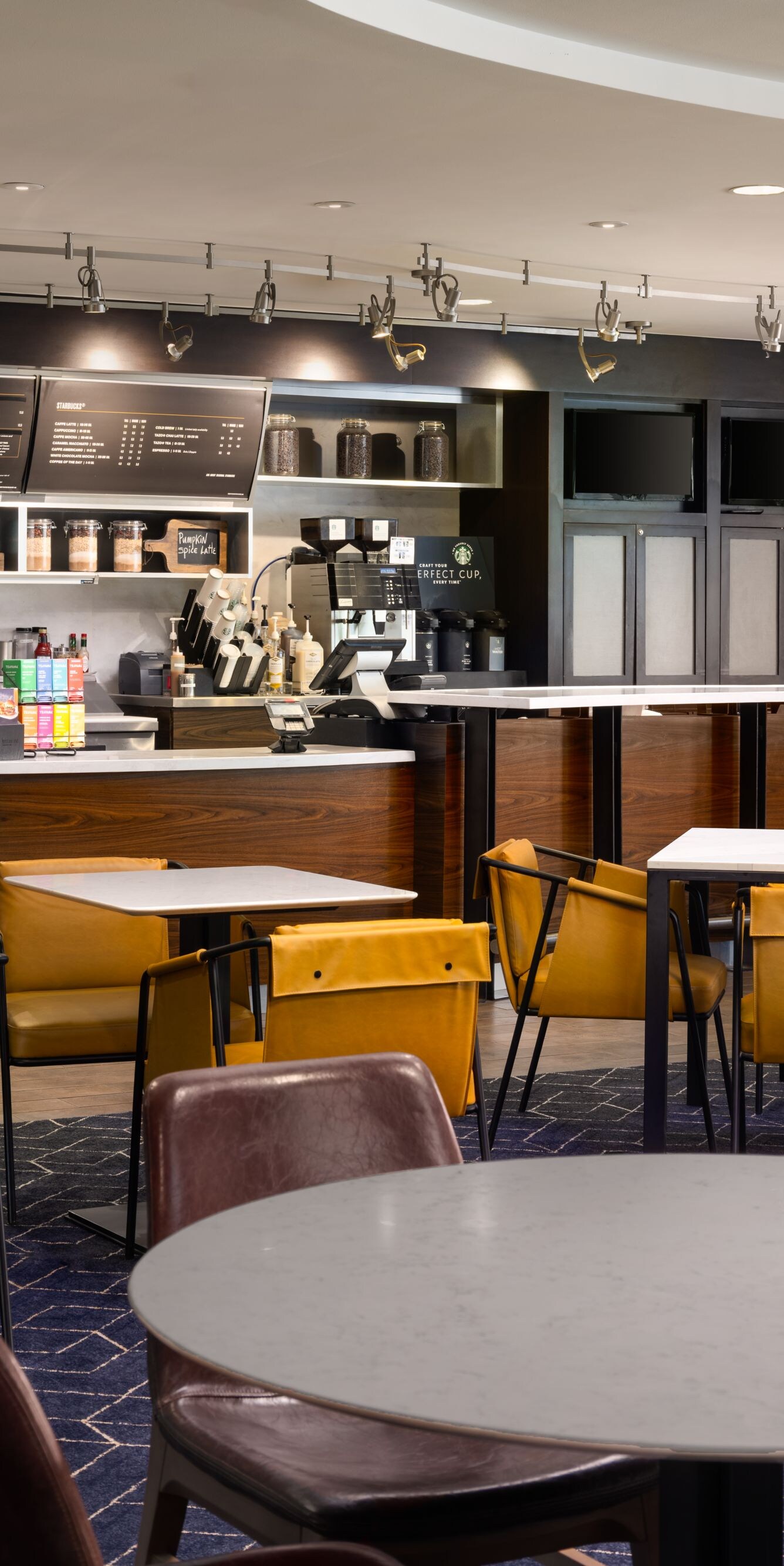 Hotel café with tables and service counter