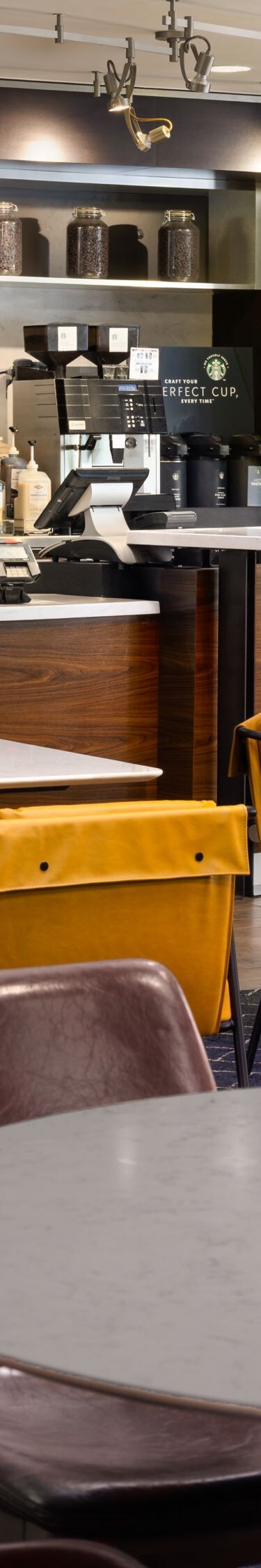 Hotel café with tables and service counter