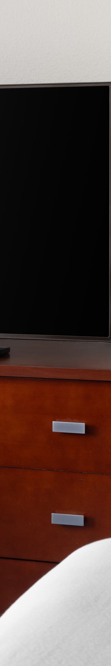 work desk with tv and coffee maker