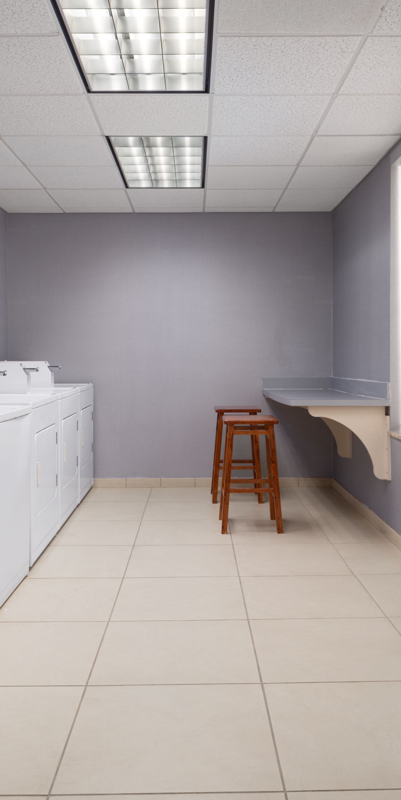 Guest laundry room with washers and dryers