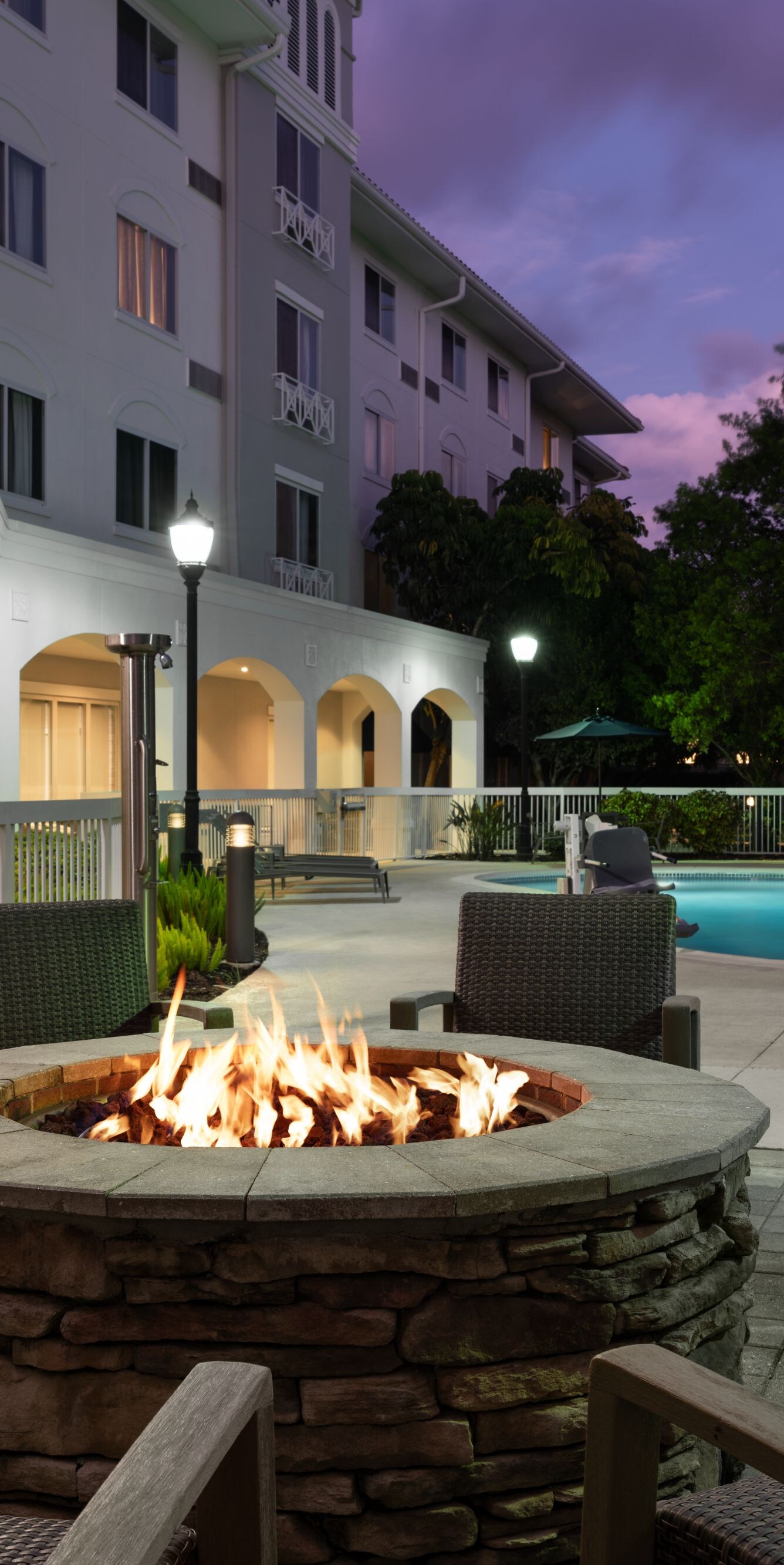 Outdoor fire pit with seating a twilight
