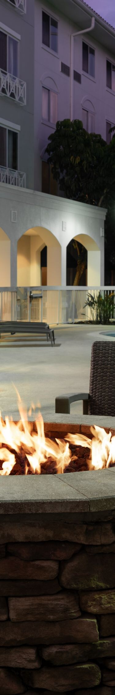 Outdoor fire pit with seating a twilight