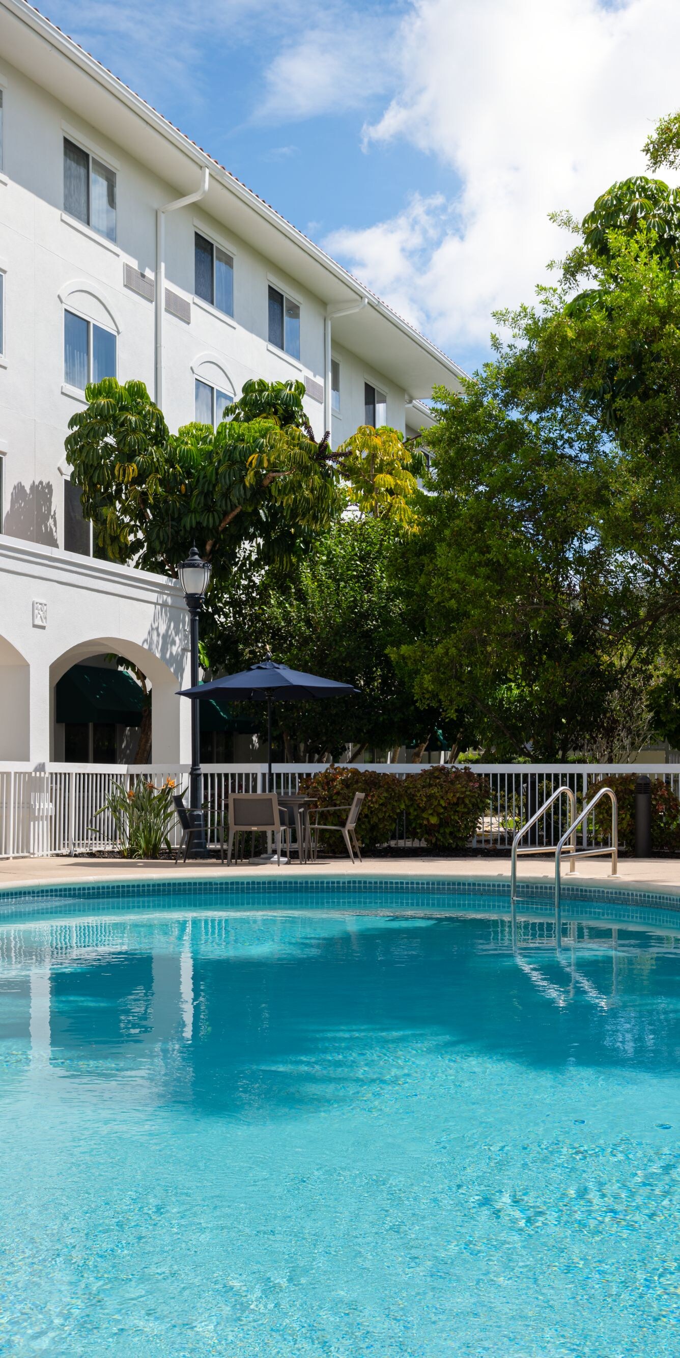 Outdoor swimming pool with lounge chairs
