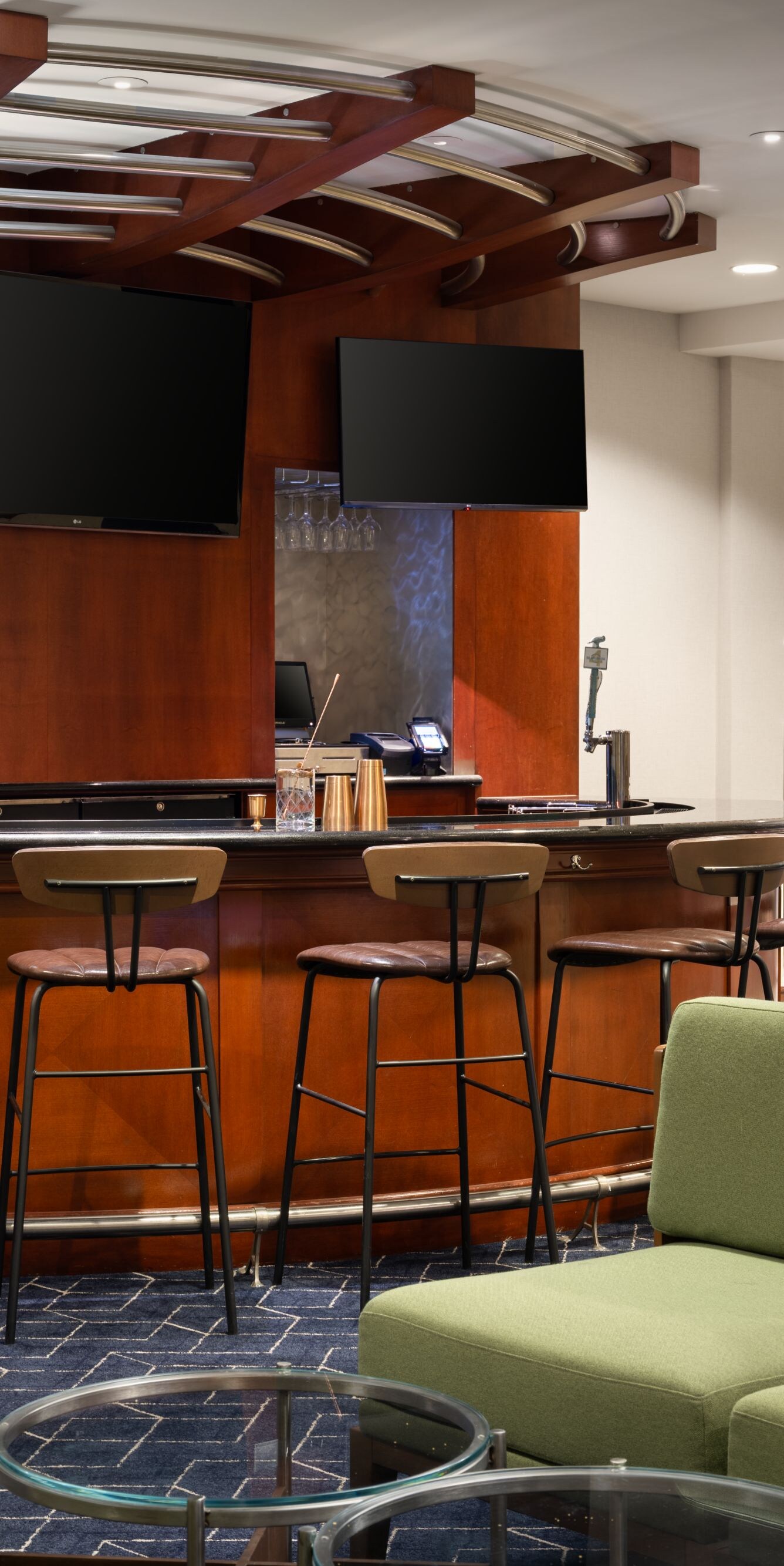 Hotel lounge with bar and seating area