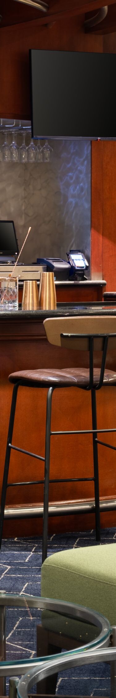 Hotel lounge with bar and seating area