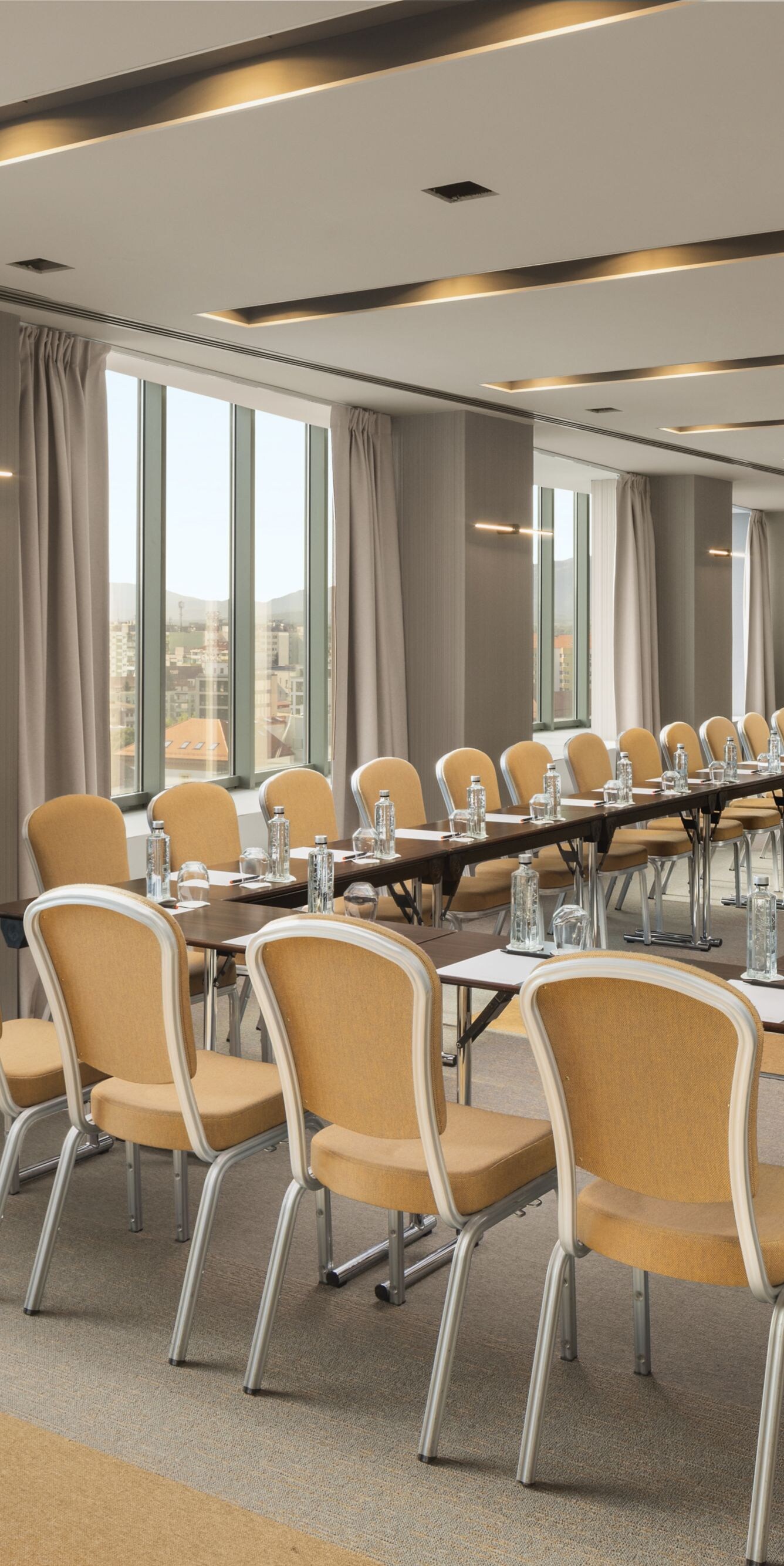 Meeting room with U-shape setup and city view