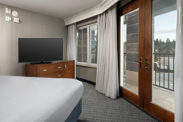 King Suite with bed and television