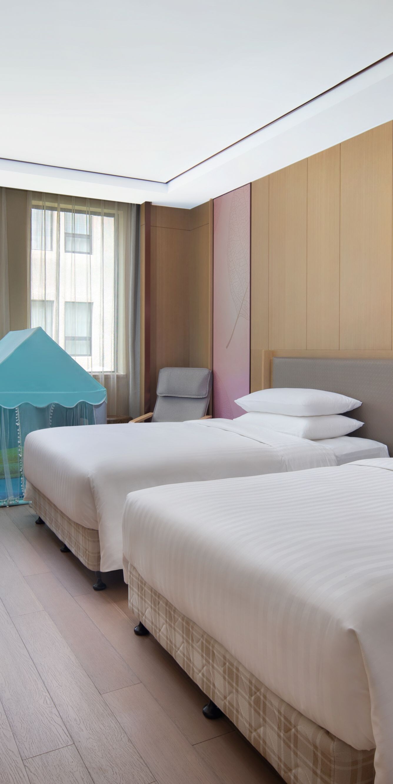 Guest Room with two double beds and tent.  