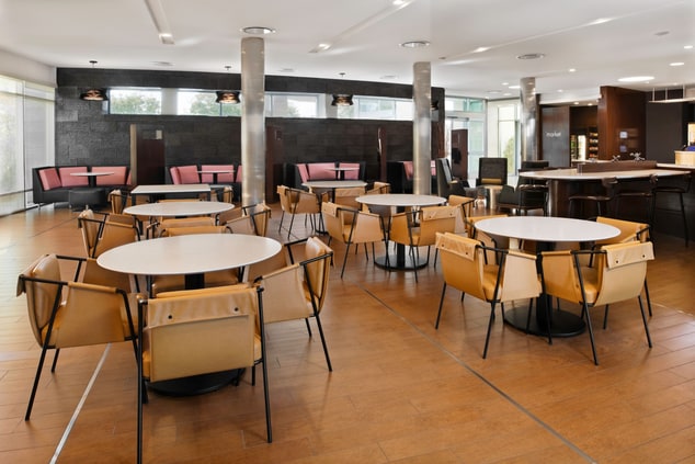 round tables and chairs in bistro seating area