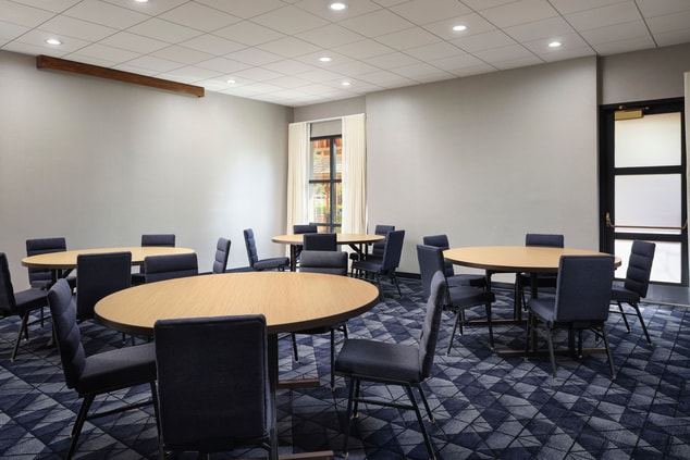 Meeting space with round tables 