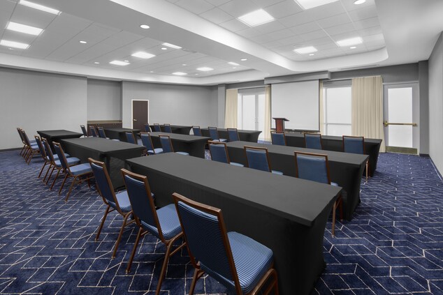 Ballroom in classroom setup with tables and chairs