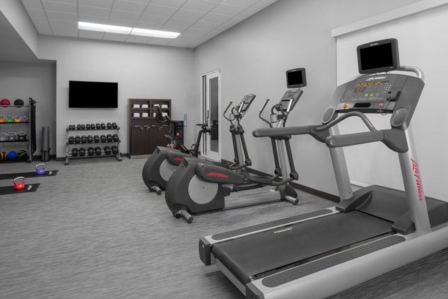 Fitness center with treadmill and ellipticals