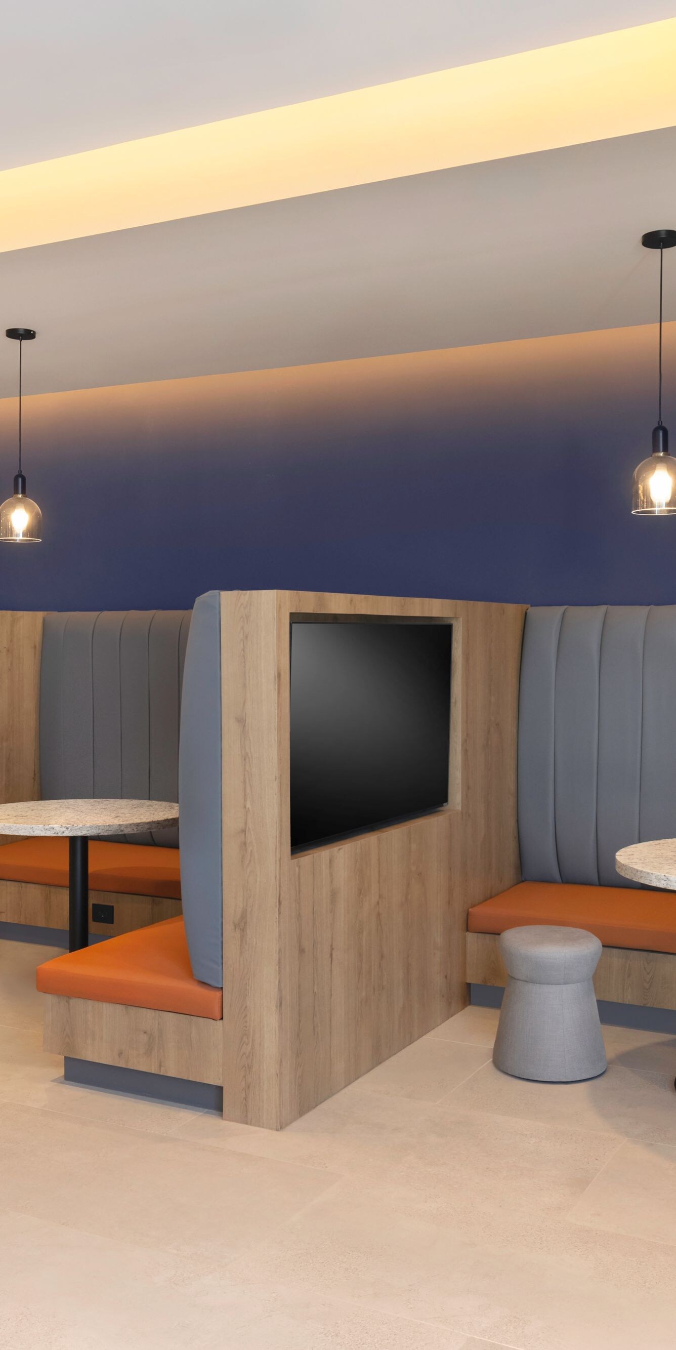 Modern booths with screens and seating