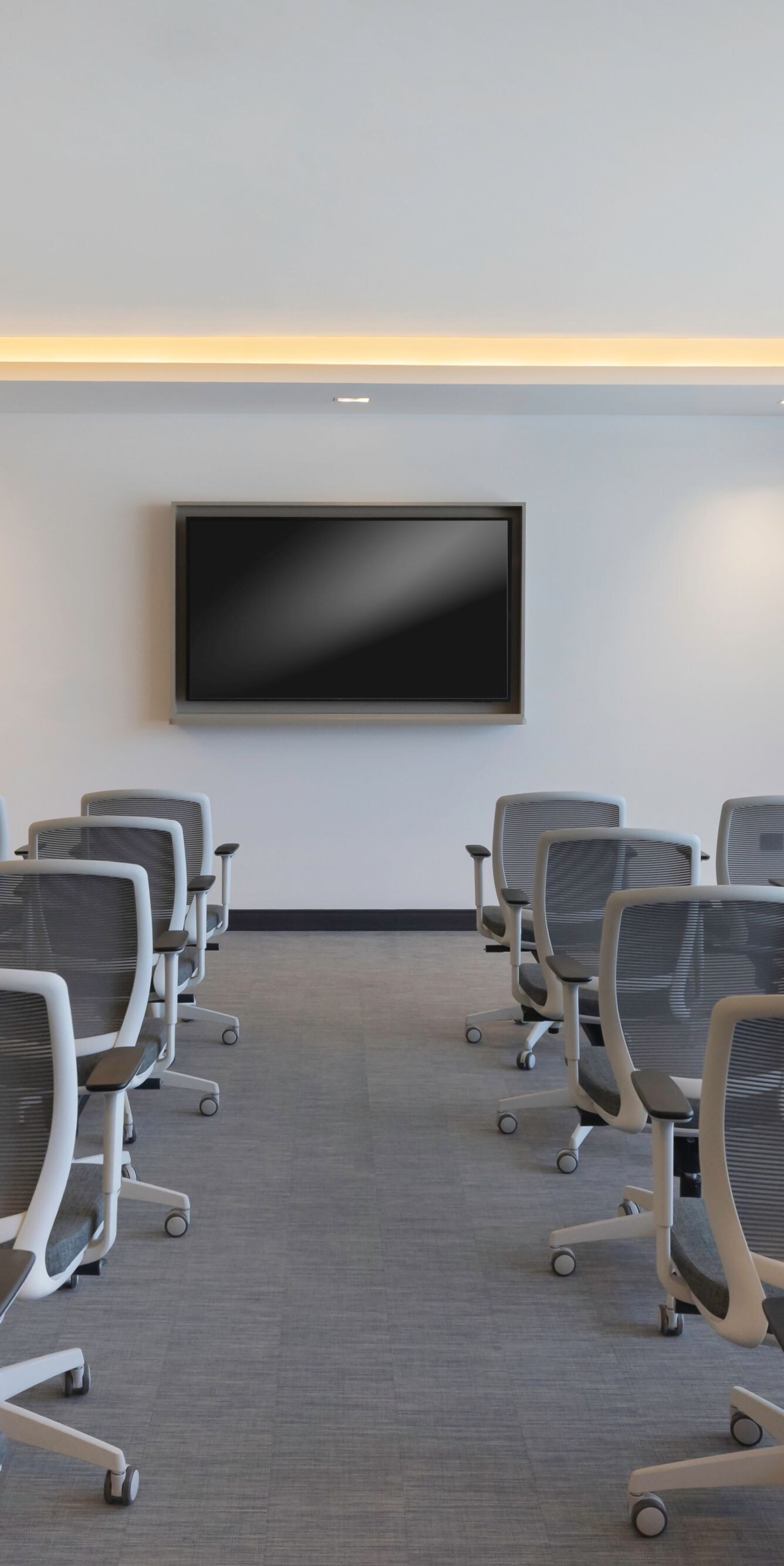 Meeting room with theater seating and screen