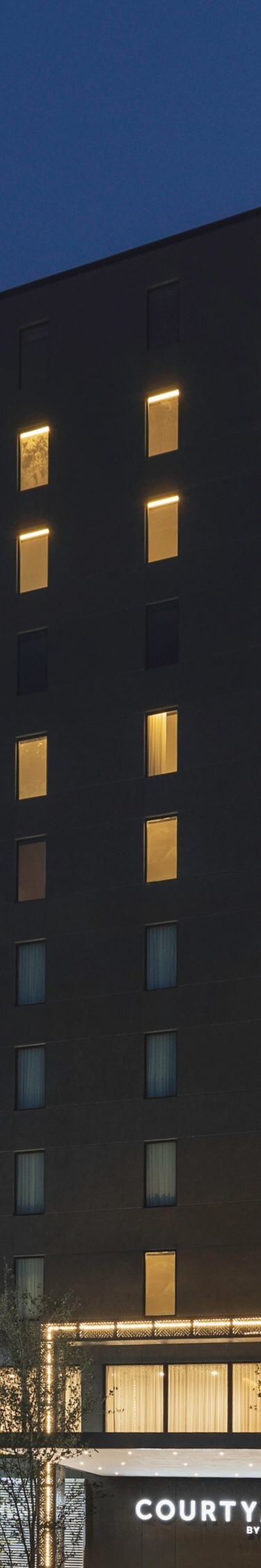 Exterior view of building at twilight
