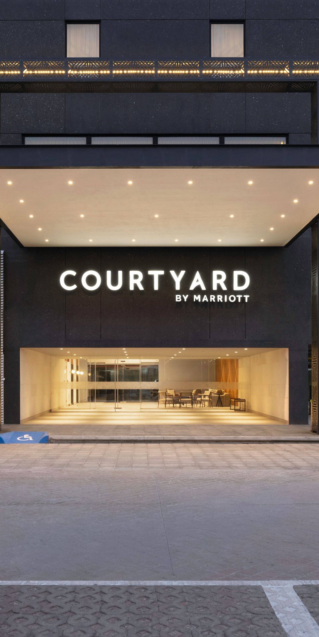 Building exterior with entrance and van