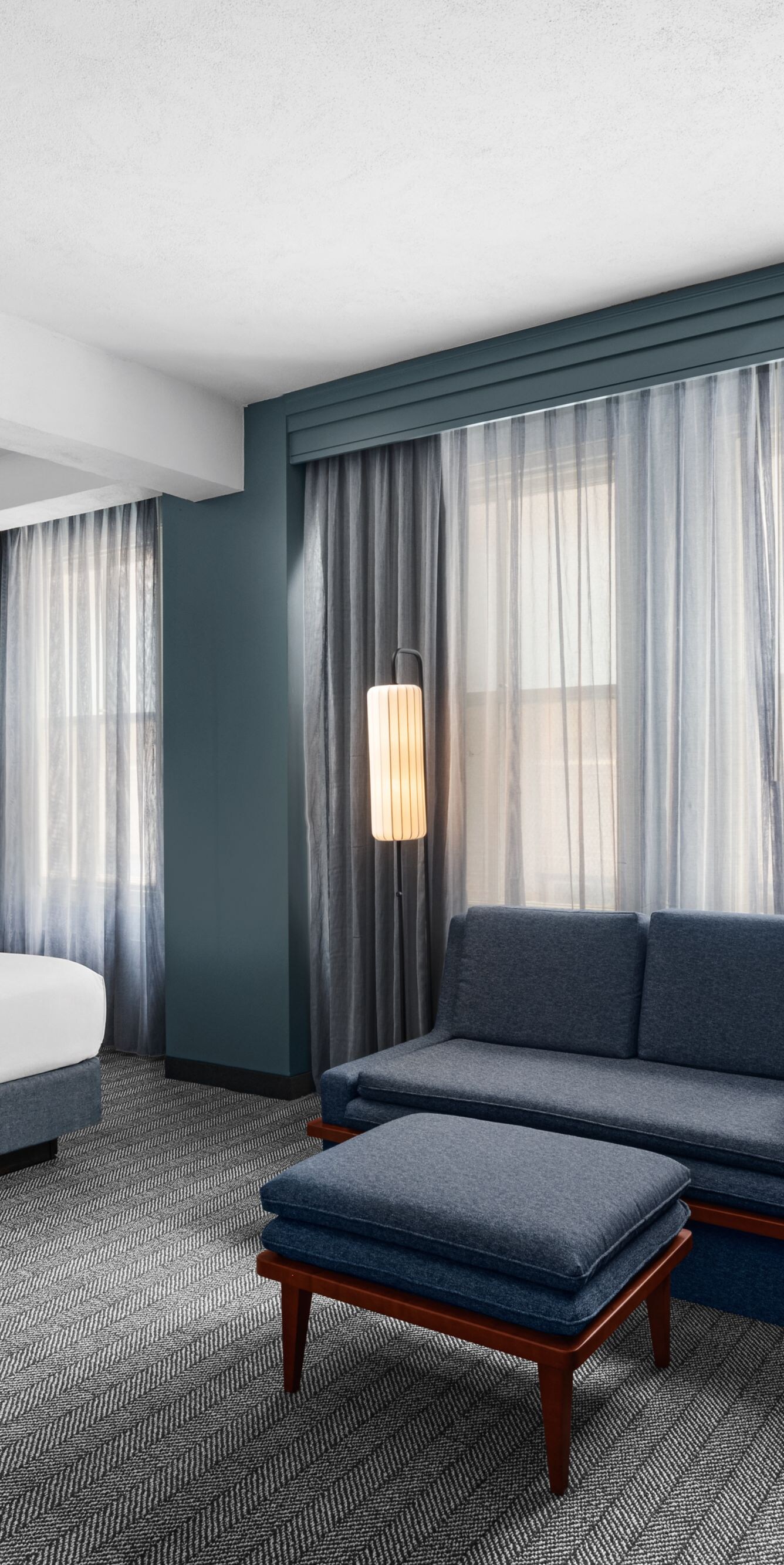 King Bed with sleeper sofa and ottoman