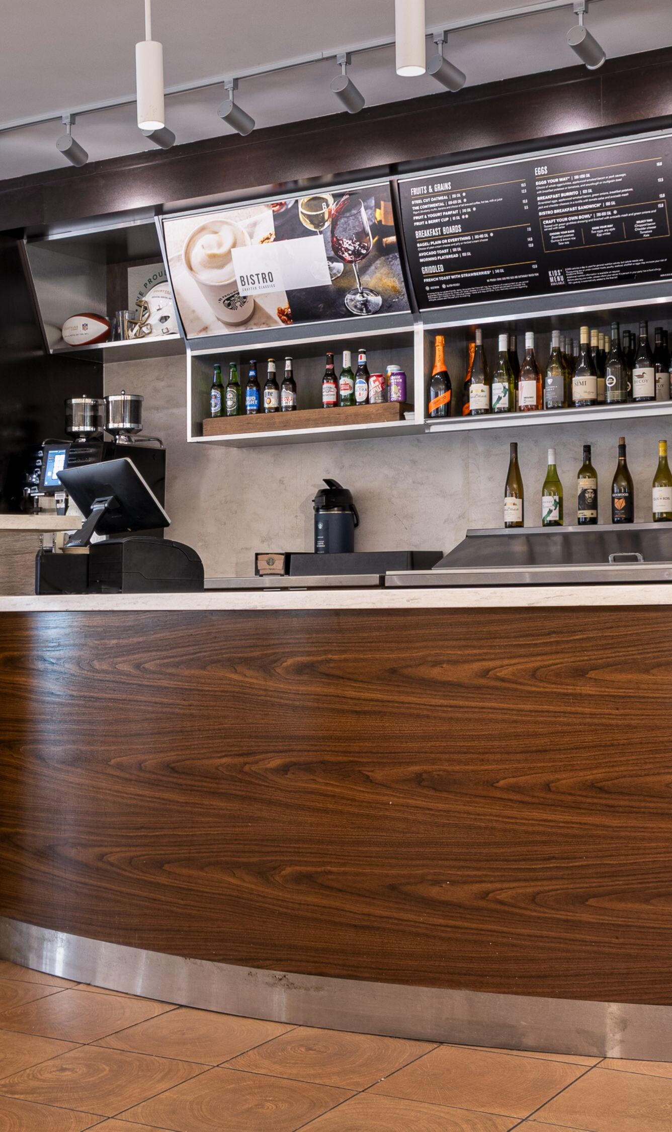 Bistro bar featuring counter seating, menu boards.