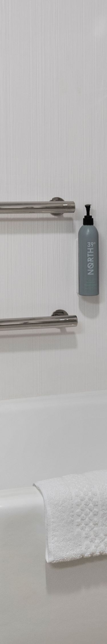  accessible tub with grab bars bathroom