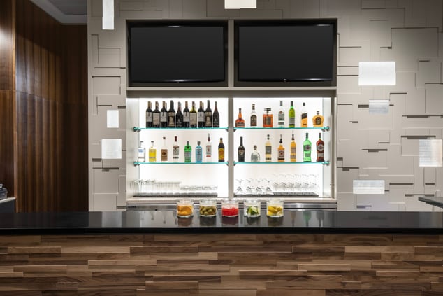 Bistro Bar with two TV's shelves of alcohol