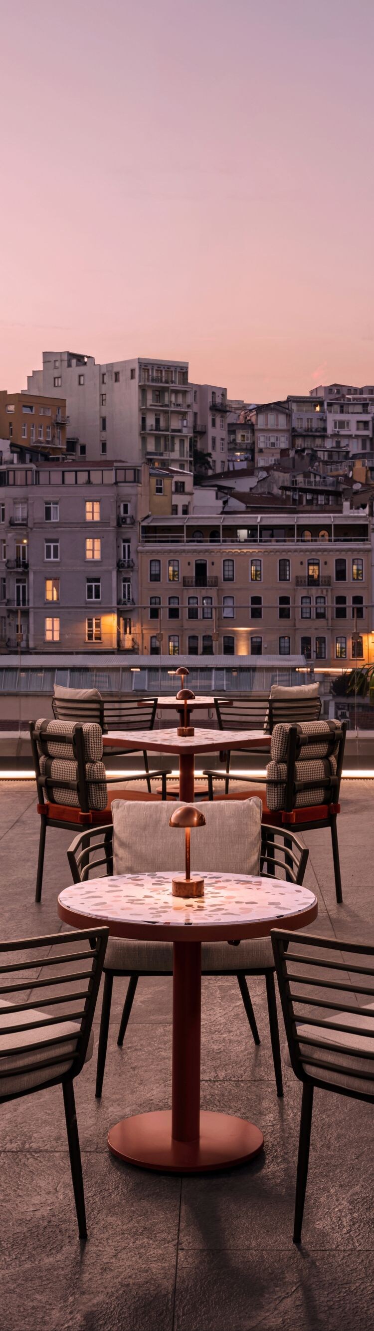 Rooftop terrace bar with city skyline views