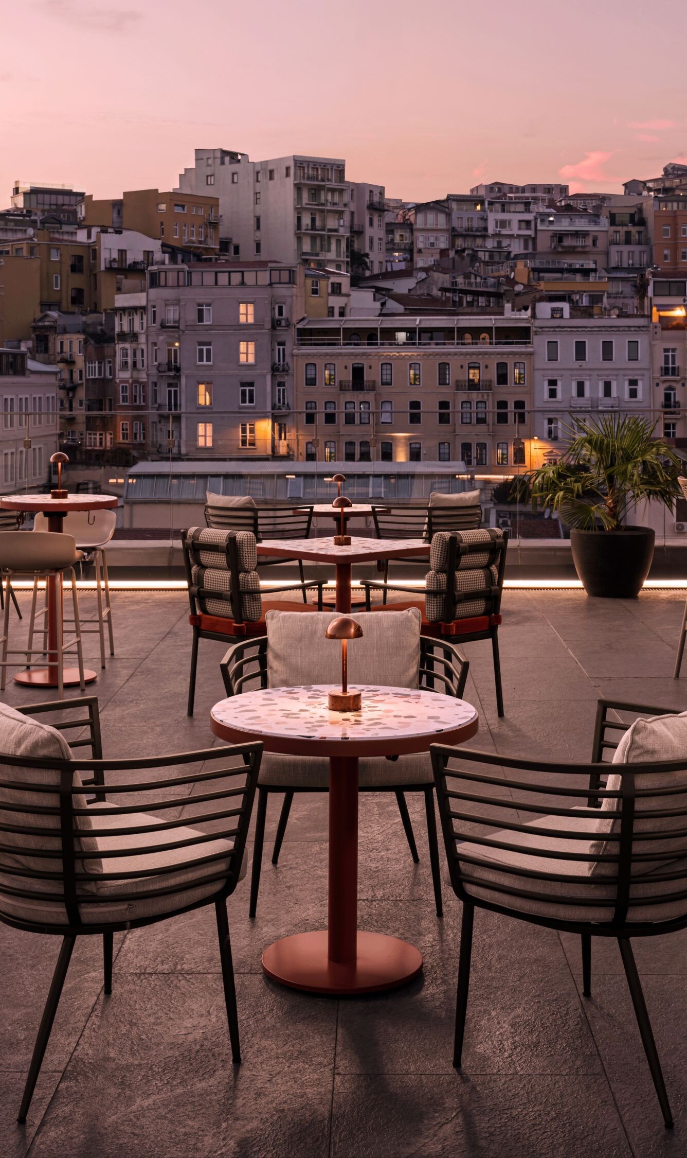 Rooftop terrace bar with city skyline views