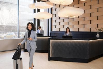 Hotel front desk and arriving guest