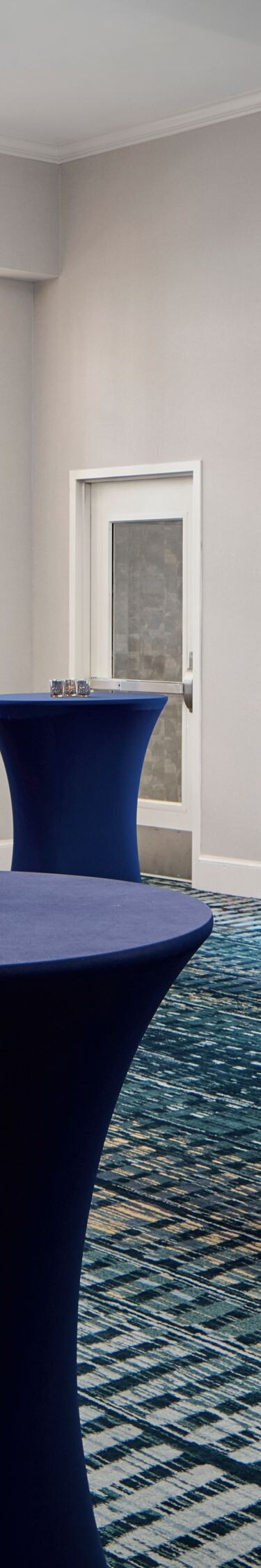 Room with tall cocktail tables