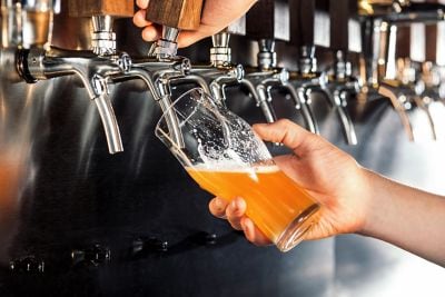 Beer on tap filling glass