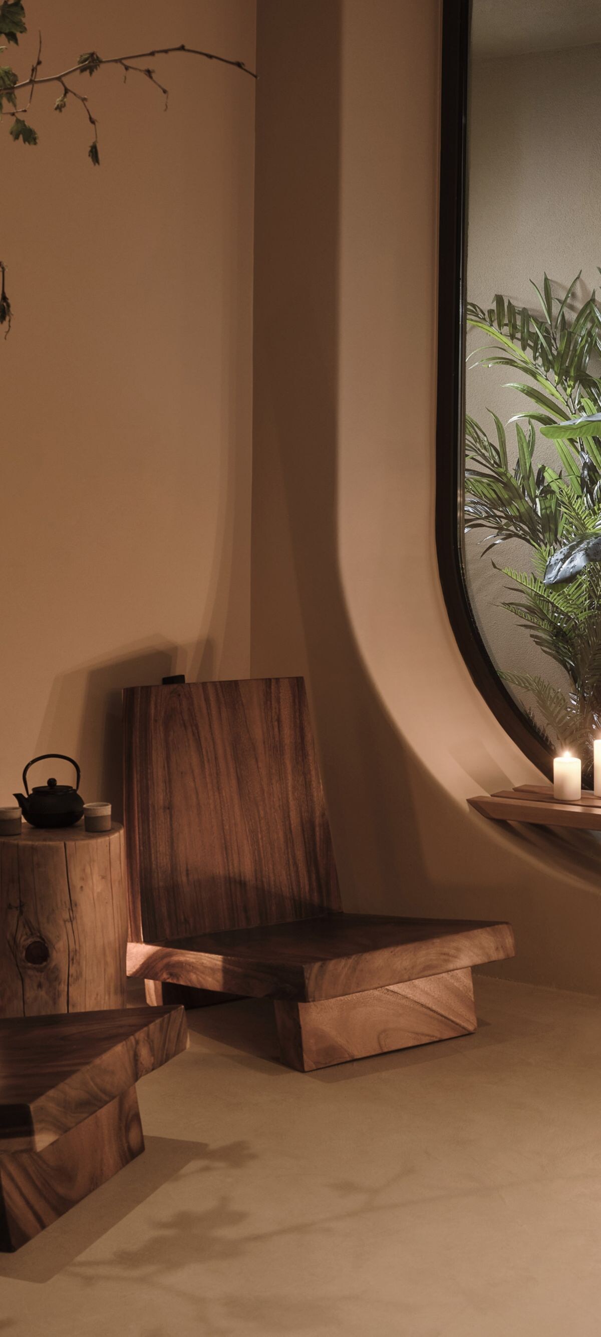 Indoor spa seating with plants and candles