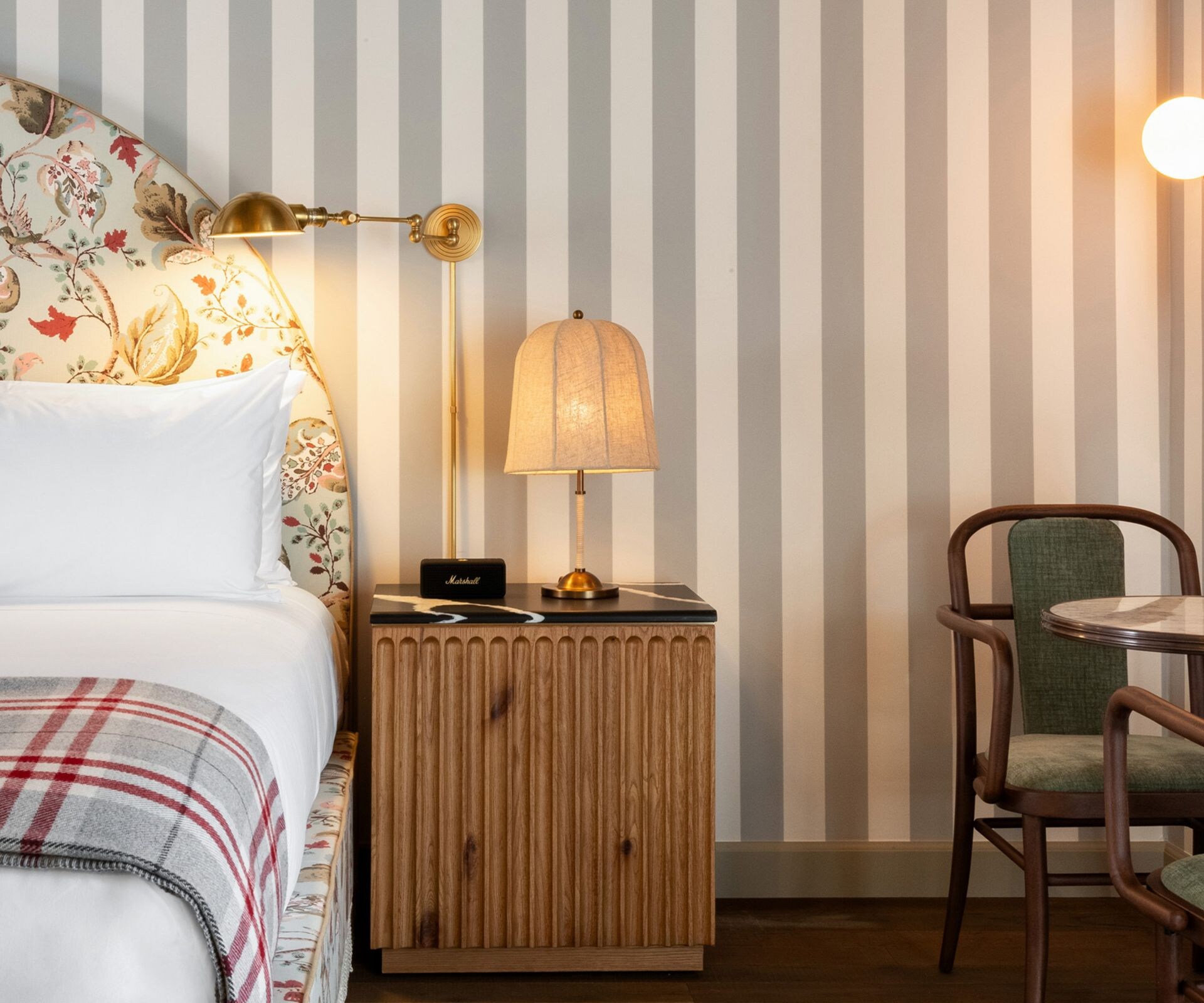 bed, sitting area, and nightstand