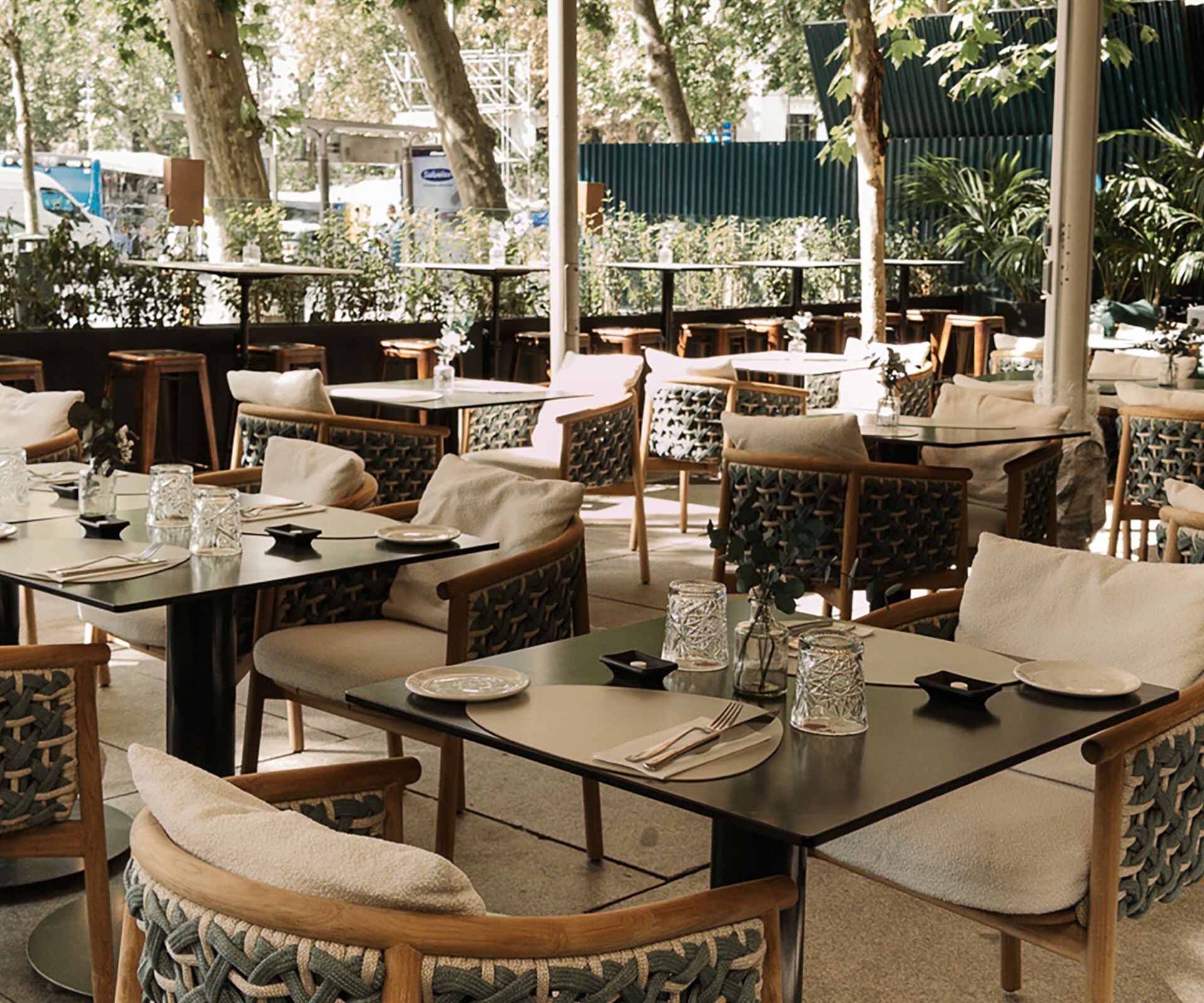Outdoor patio restaurant with tables and chairs
