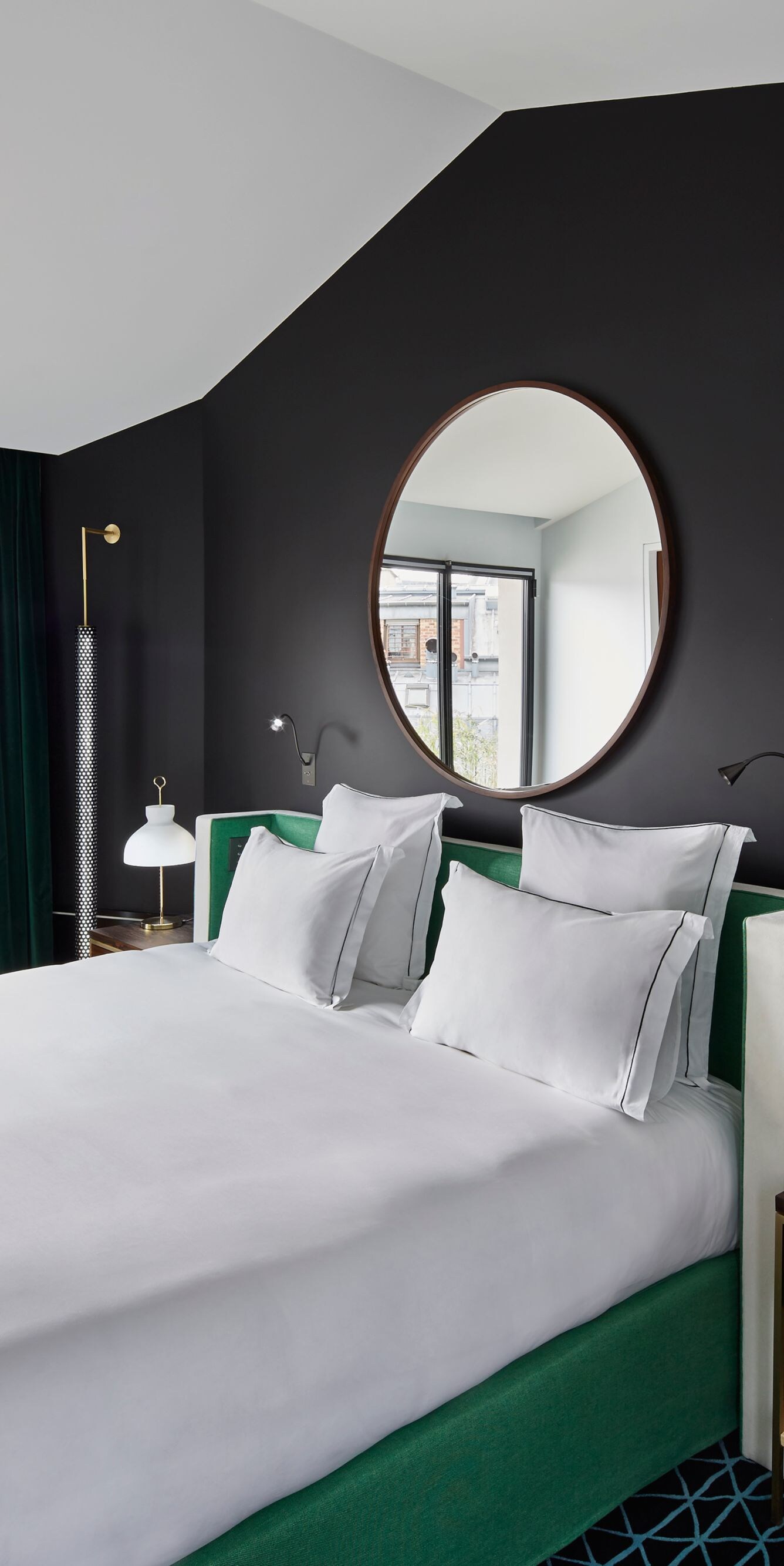 King bed with partition wall between bedroom