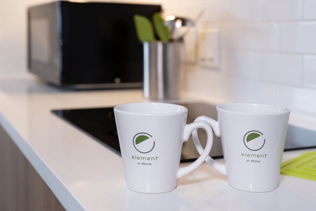 Coffee mugs on kitchenette counter