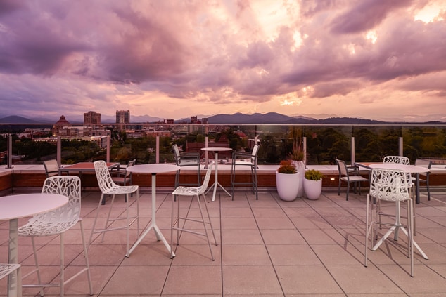 Rooftop Patio Views Mountains and City Skyline
